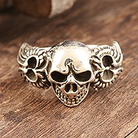 Sterling silver cocktail ring, 'Skull On Wings' - Unisex Handcrafted Sterling Silver Winged Skull Ring