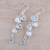 Blue topaz and rainbow moonstone dangle earrings, 'Morning Climber' - Blue Topaz and Rainbow Moonstone Earrings from India