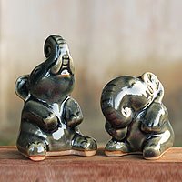 Celadon ceramic statuettes, 'Happy Dark Green Elephants' (pair) - Handcrafted Dark Green Celadon Ceramic Elephants (Pair)