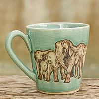 Celadon ceramic mug, 'Cozy Family' - Aqua Celadon Ceramic Mug with Hand Painted Elephants