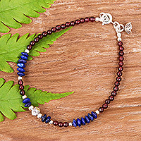 Lapis lazuli and garnet charm bracelet, 'Bright Mind in Red' - Lapis Lazuli and Garnet Beaded Charm Bracelet