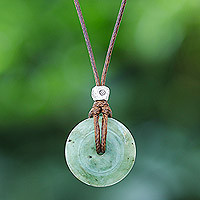 Jade pendant necklace, 'Noble Core' - Silver and Natural Jade Pendant Necklace from Thailand