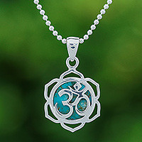 Sterling silver pendant necklace, 'Sacred Peace Bloom' - Floral Om-Themed Reconstituted Turquoise Pendant Necklace