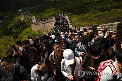 中, 설·노동절 휴일 늘렸다…내수진작 기대