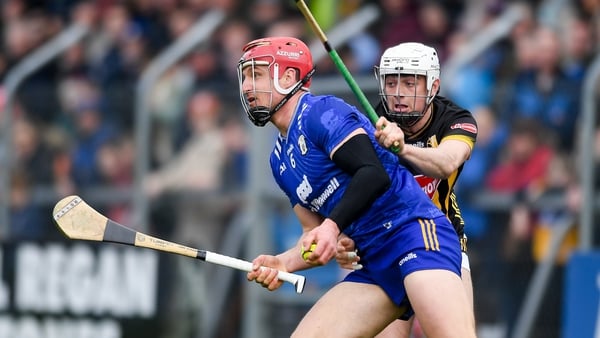 John Conlon of Clare is tackled by Cian Kenny of Kilkenny