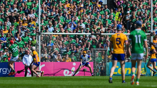 Donnacha Ó Dalaigh of Limerick beats Eibhear Quilligan in the Clare goal in the 3-15 to 1-18 victory for the All-Ireland champions in April