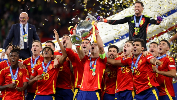 Alvaro Morata lifts the Henri Delaunay Trophy