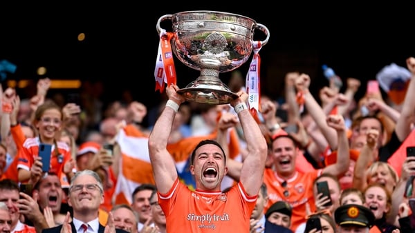 Aidan Forker lifts Sam Maguire, the second Armagh captain to do so after his manager Kieran McGeeney