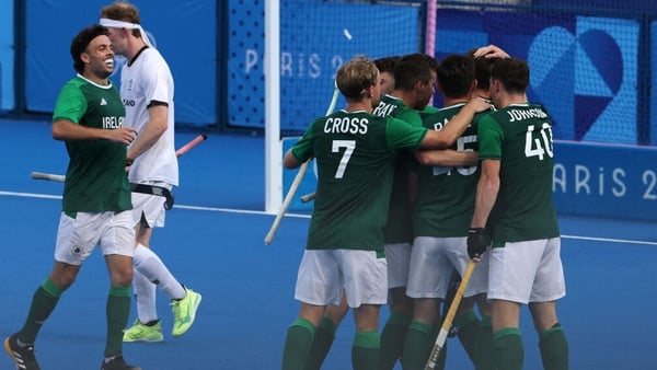 Ireland's players celebrate Jeremy Duncan's winning goal against New Zealand