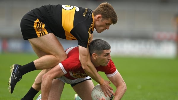 Paul Geaney in action against Gavin White of Dr Crokes