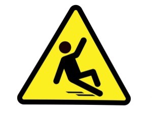 Warning sign showing a stick figure slipping