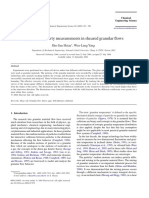 Transport Property Measurements in Sheared Granular Flows