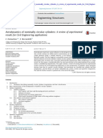 Aerodynamics of Nominally Circular Cylinders - Review