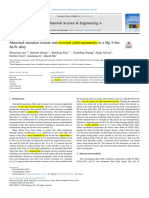 Abnormal Extrusion Texture and Reversed Yield Asymmetry in A MgYSmZnZr Alloy