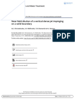 Near-Field Dilution of A Vertical Dense Jet Impinging On A Solid Boundary