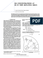 Stress Concentrations at Holes in Thin Rotating Discs: ANG L. TAN