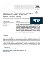 Compressive Strength of Tubular Members With Localized Pitting