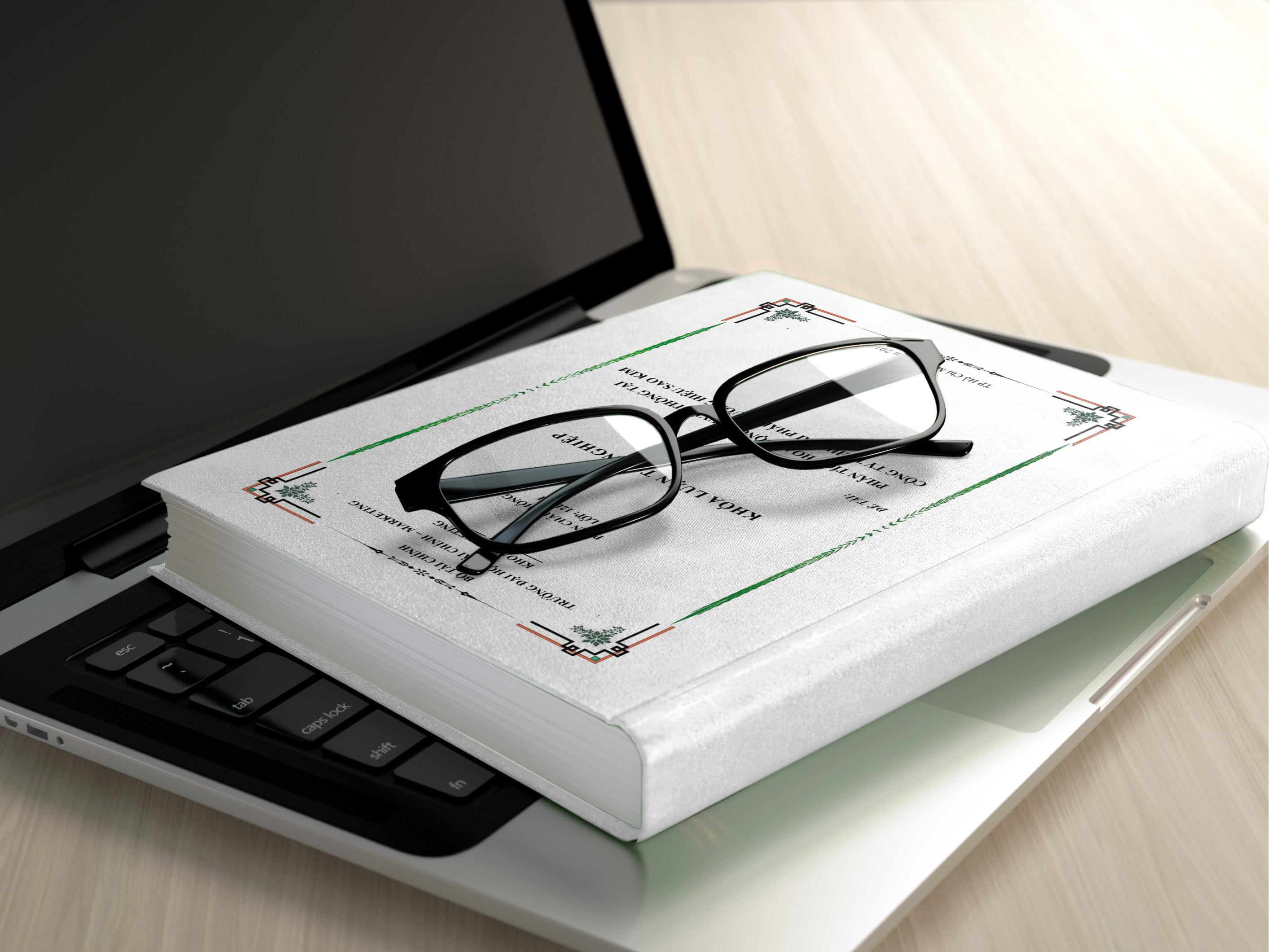 Black frame eyeglasses on white book photo