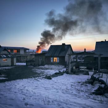 Gray Wooden House Burning