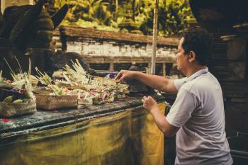 Man Fixing Flower Arrangements