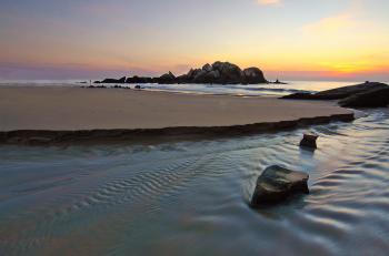 Scenic View of Ocean During Dusk