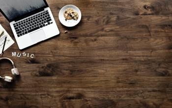 Photo of a Laptop Near Cookies