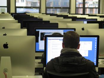 Rear View of Man Working in Office