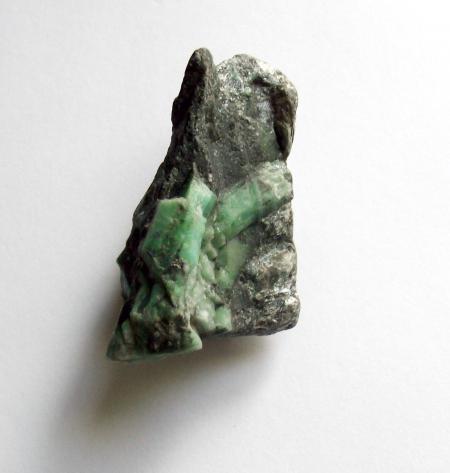 Raw uncut emerald gemstone