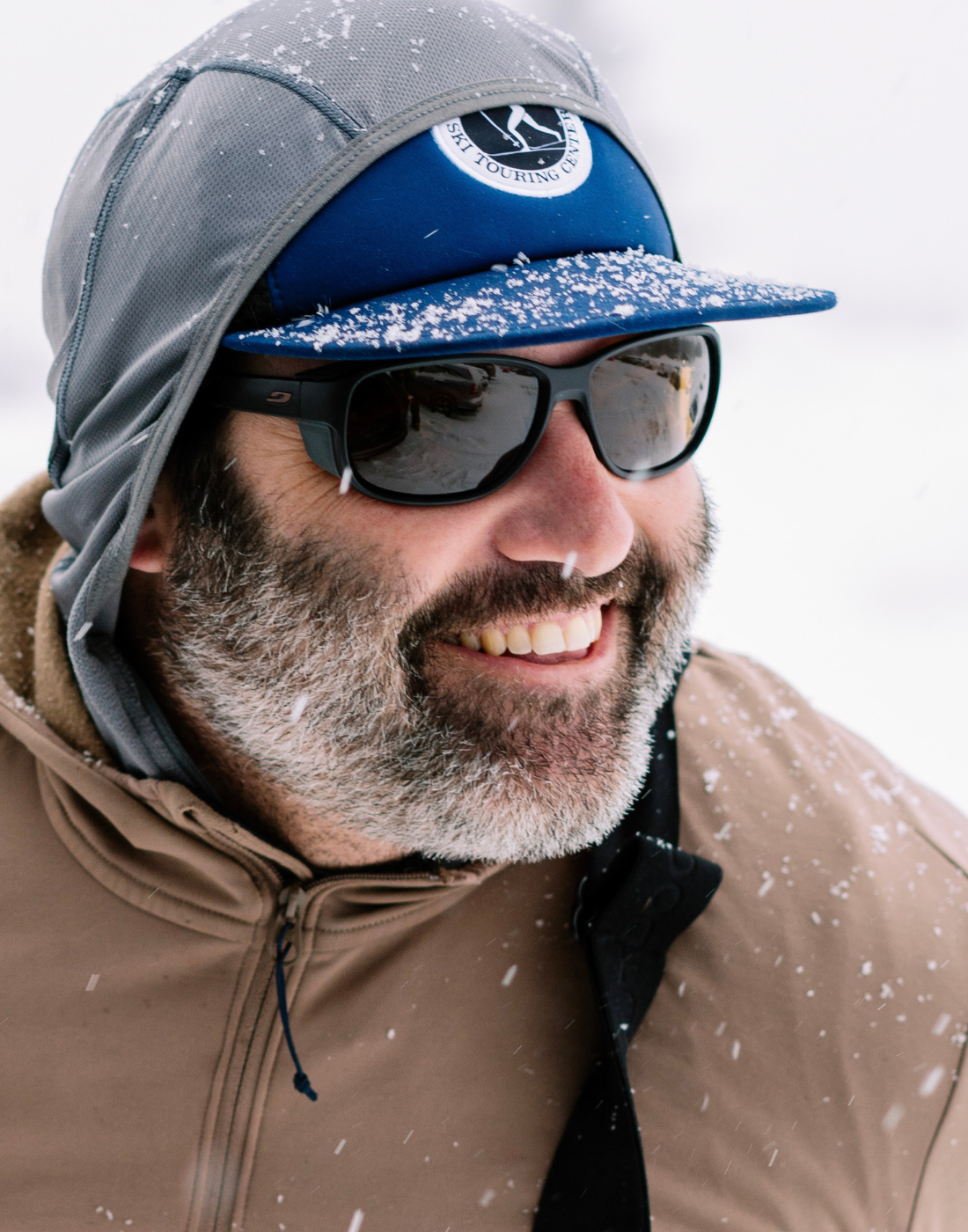 Image of a man wearing mountain sunglasses that links to the mountain collection