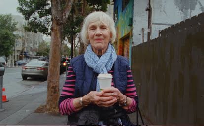 A woman with coffee who has shared details about her relationship to technology.