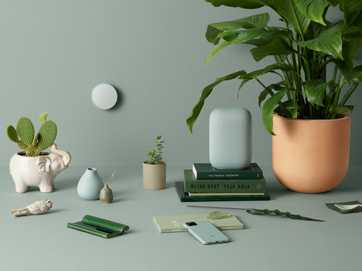 A group of neatly organized Google products sit on a desktop table space