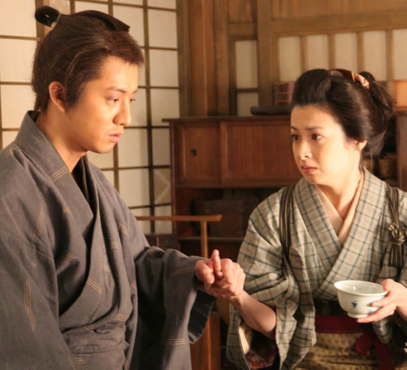 Takuya Kimura and Rei Dan in Love and Honor (2006)