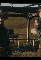 Guillermo Alonso and Tom Blyth in Billy the Kid (2022)