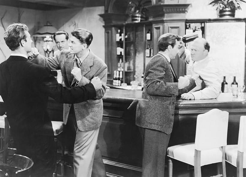 Ronald Reagan, Dewey Robinson, and Zachary Scott in Stallion Road (1947)