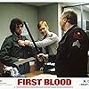 Sylvester Stallone, David Caruso, and Jack Starrett in First Blood (1982)