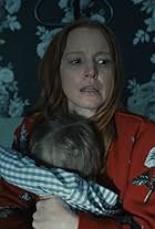 Lauren Ambrose and James Hoogerwerff in Awake (2023)