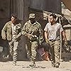 Tom Cruise, Courtney B. Vance, and Jake Johnson in The Mummy (2017)