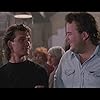 Patrick Swayze and Travis McKenna in Road House (1989)