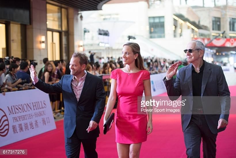 Art Marcum, Jenny Pellicer, and Michael Shamberg walk the Red Carpet event at the World Celebrity Pro-Am 2016 Mission Hills China Golf Tournament on 20 October 2016, in Haikou, China. October 20, 2016 