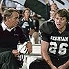 Billy Bob Thornton and Garrett Hedlund in Friday Night Lights (2004)