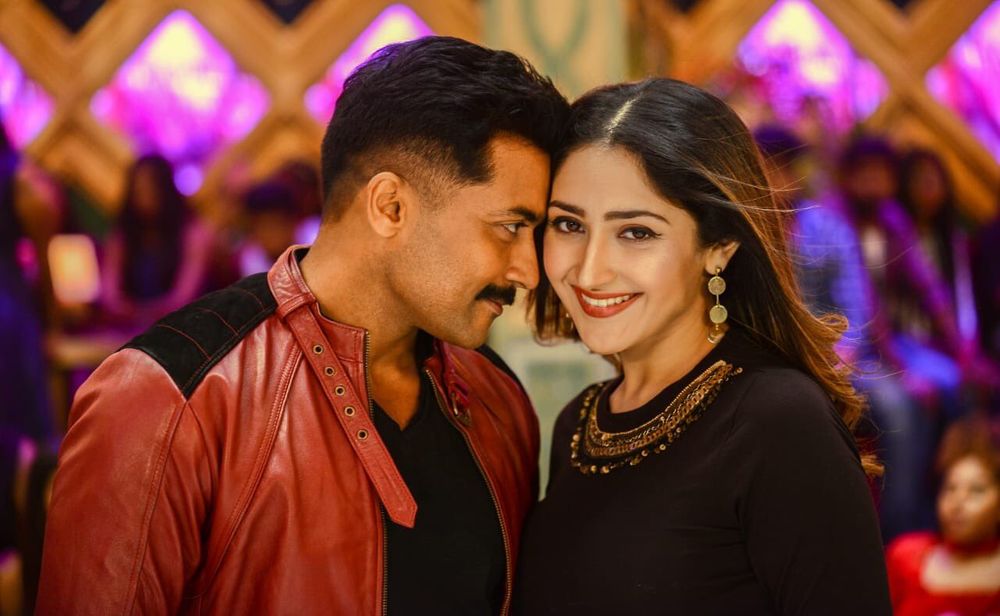 Suriya and Sayyeshaa Saigal in Kaappaan (2019)