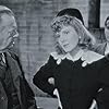 Jean Arthur, Charles Coburn, and Robert Cummings in The Devil and Miss Jones (1941)