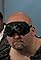 Keep Your Heart Rate Up by Staring at a Bald Man Wearing Goggles's primary photo