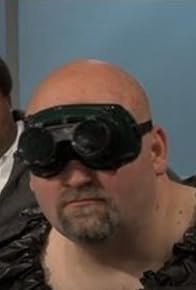 Primary photo for Keep Your Heart Rate Up by Staring at a Bald Man Wearing Goggles