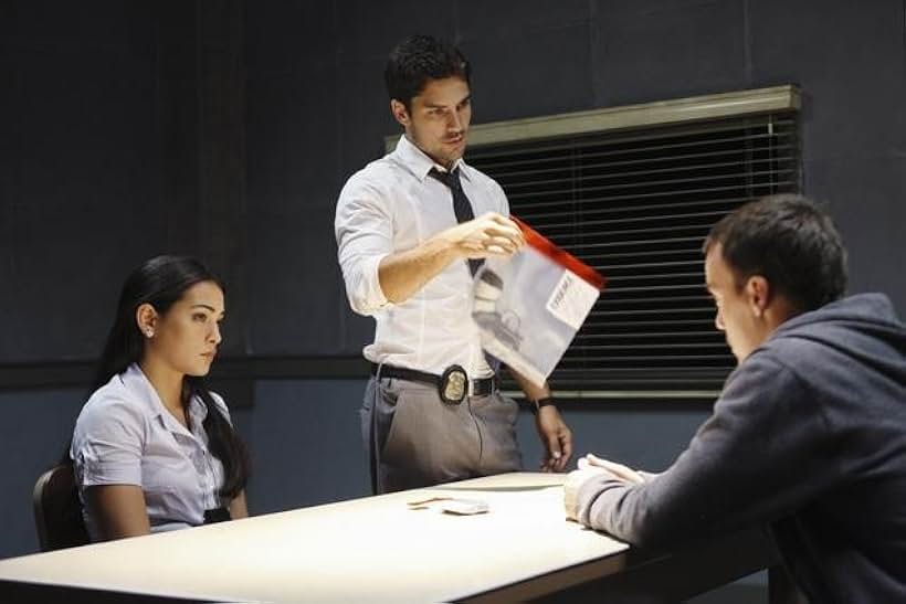 Mike Foy, D.J. Cotrona, and Natalie Martinez in Detroit 1-8-7 (2010)