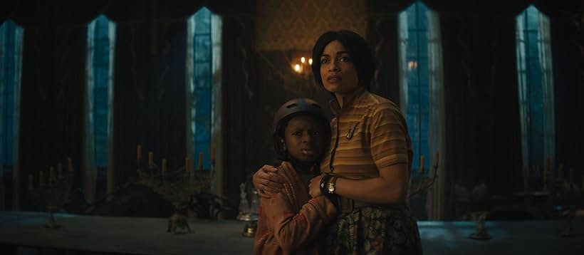 Rosario Dawson and Chase Dillon in Haunted Mansion (2023)