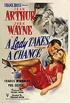 John Wayne and Jean Arthur in A Lady Takes a Chance (1943)