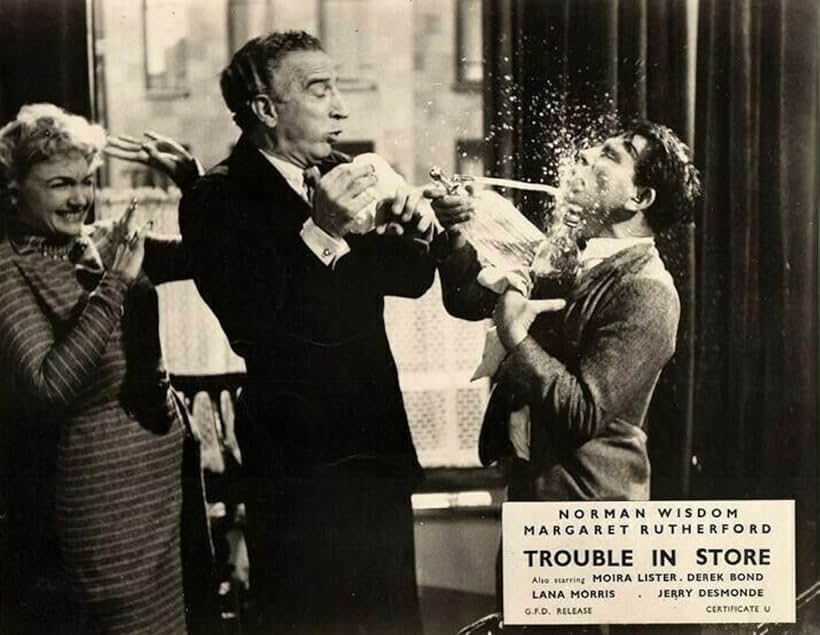 Jerry Desmonde, Moira Lister, and Norman Wisdom in Trouble in Store (1953)