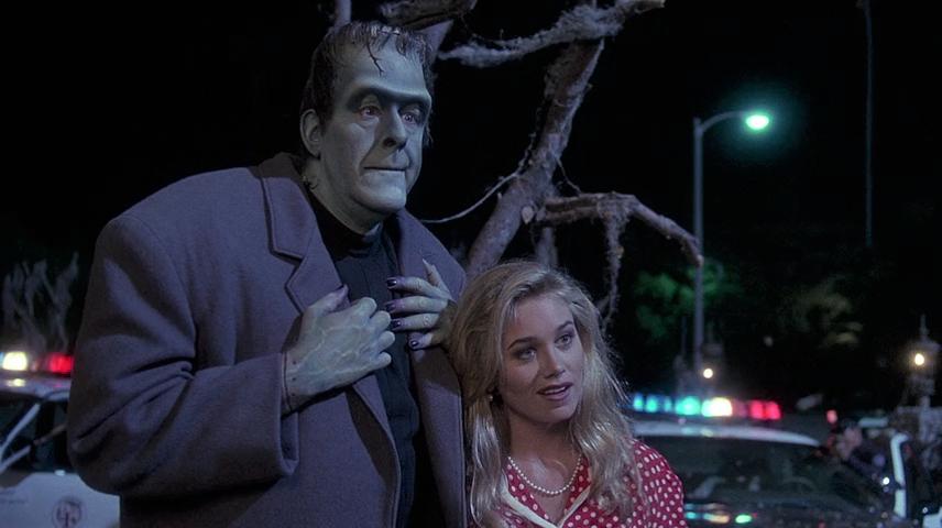 Edward Herrmann and Christine Taylor in Here Come the Munsters (1995)