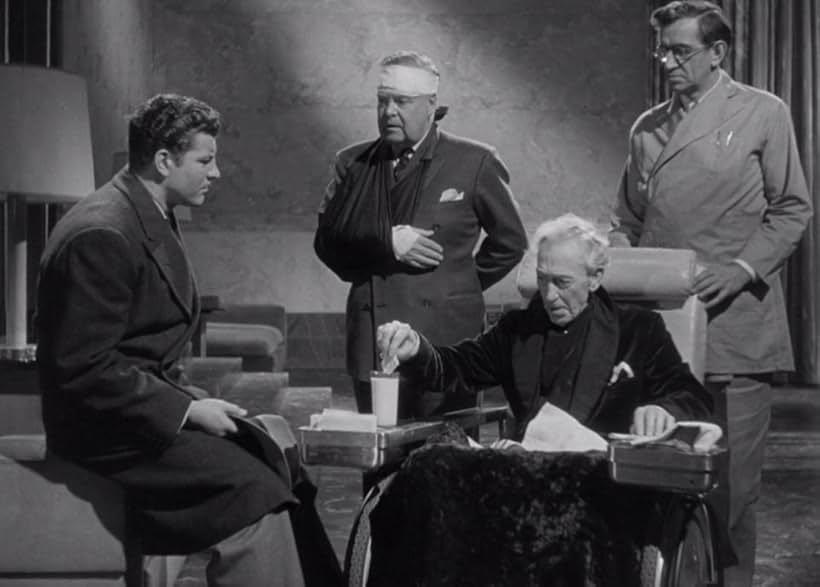 Earle S. Dewey, Victor Kilian, Tully Marshall, and Robert Preston in This Gun for Hire (1942)